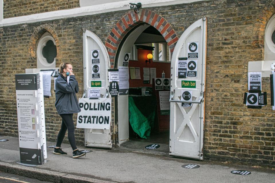 People arrive in the morning at a polling station in Wimbledon to vote on Super ThursdayAlamy Live News.