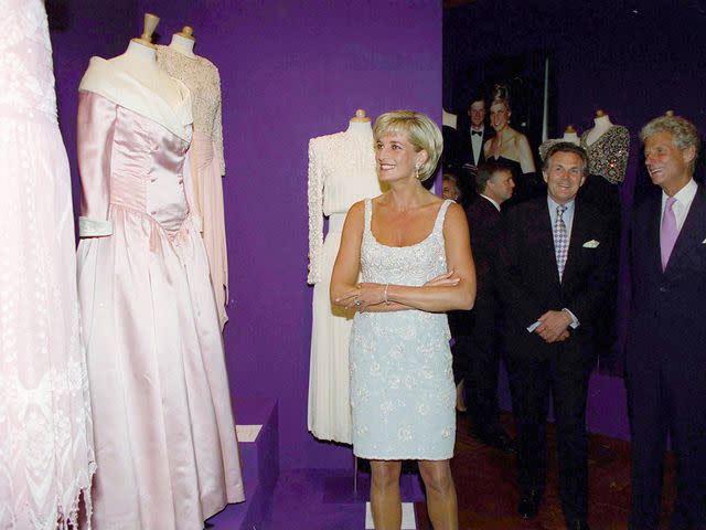 <p>Tim Graham Photo Library/Getty</p> Princess Diana with Christopher Balfour and Lord Hindlip at a private viewing and reception at Christies for the auction in aid of the Aids Crisis Trust and The Royal Marsden Hospital Cancer Fund.