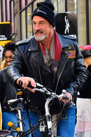 <p>Raymond Hall/GC Images</p> Christopher Meloni joins SAG-AFTRA members on strike during Halloween