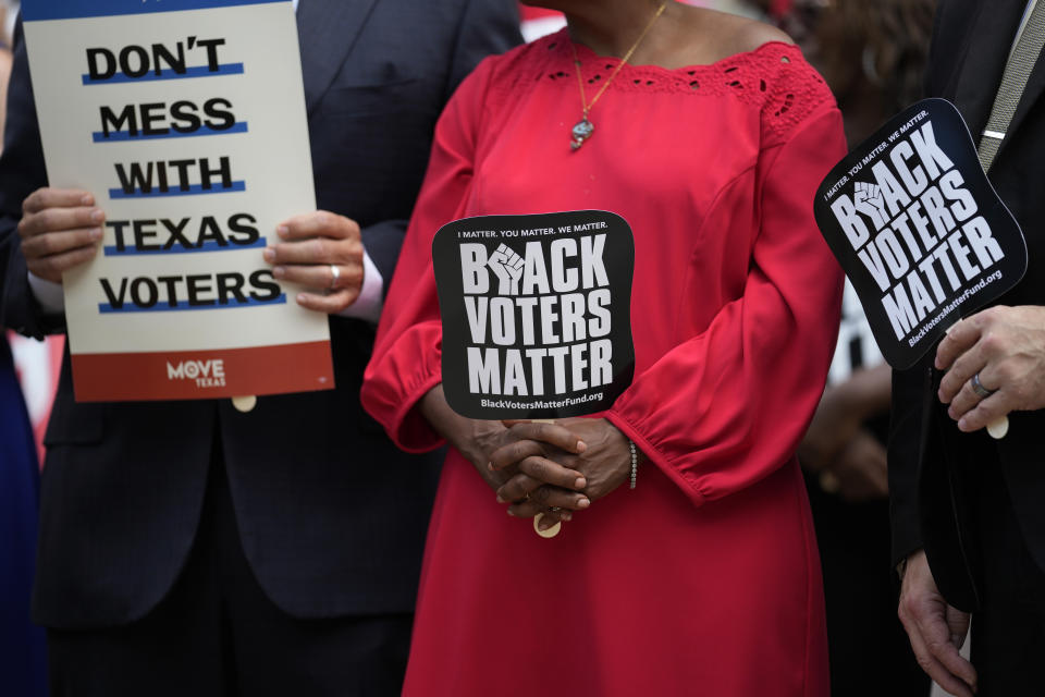 Democratic caucus members of the Texas House join a rally on the steps of the Texas Capitol to support voting rights, Thursday, July 8, 2021, in Austin, Texas. (AP Photo/Eric Gay)