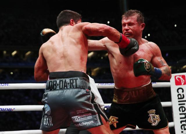 Home hero Alvarez seals unanimous victory over Ryder to retain titles