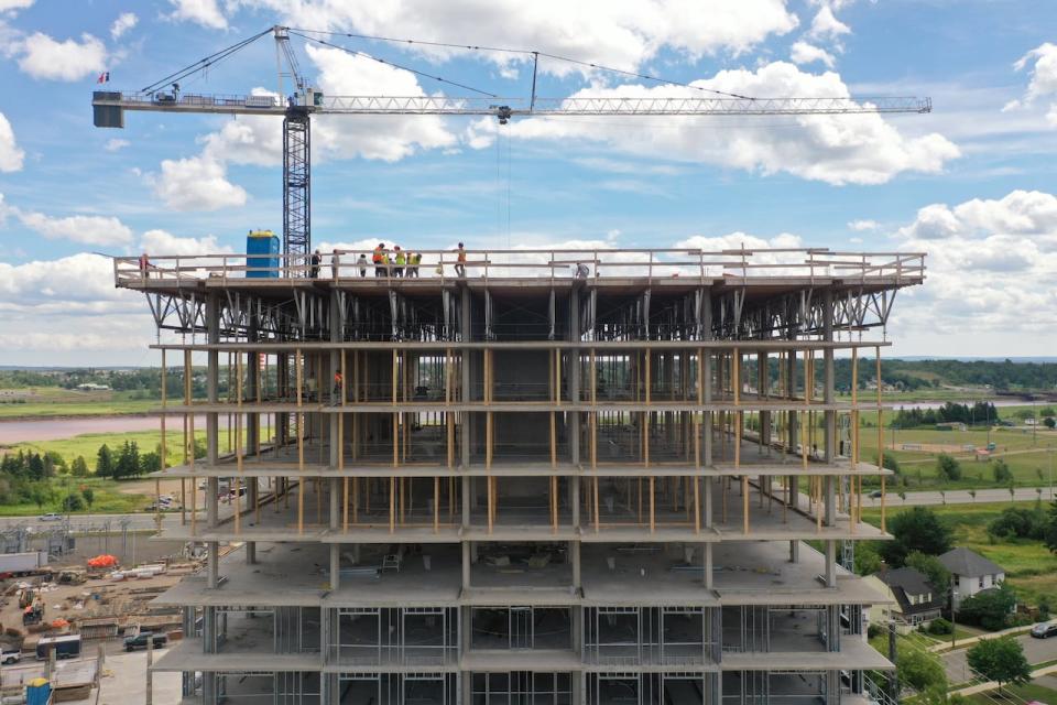 A new 15-story building, one of three planned towers on the site called the Three Sisters, will begin construction in downtown Moncton, NB on July 27, 2022.