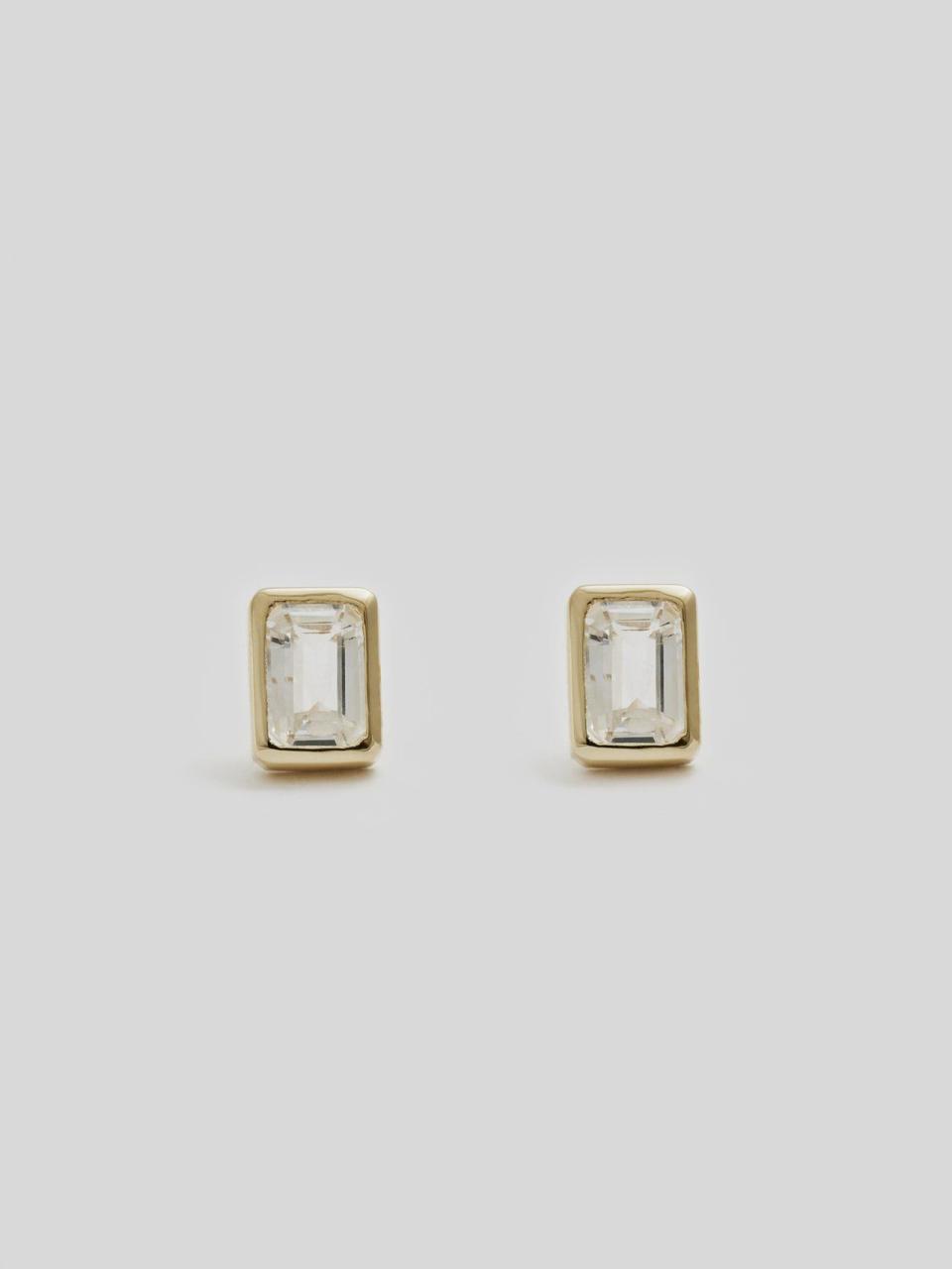 <p><strong>Loren Stewart </strong></p><p>lorenstewart.com</p><p><strong>$363.00</strong></p><p><a href="https://www.lorenstewart.com/collections/earrings/products/emerald-cut-bezel-studs" rel="nofollow noopener" target="_blank" data-ylk="slk:Shop Now;elm:context_link;itc:0;sec:content-canvas" class="link ">Shop Now</a></p><p>A simple emerald-cut diamond earring is timeless. </p>