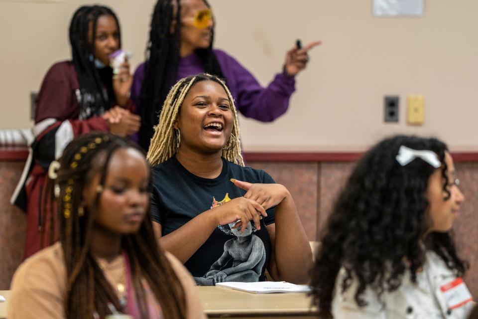 Film writer, producer and Teaneck native Chris Brancato (not shown) gives the first of five lectures on screenwriting at the Rodda Community Center in Teaneck, NJ on Friday September 16, 2022. Kayla Williford-Jones answers a question during the lecture.