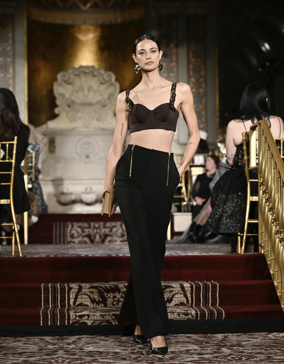 A model walks the runway during the Christian Siriano Fall/Winter 2024 fashion show at The Plaza Hotel during New York Fashion Week on Thursday, Feb. 8, 2024, in New York. (Photo by Evan Agostini/Invision/AP)