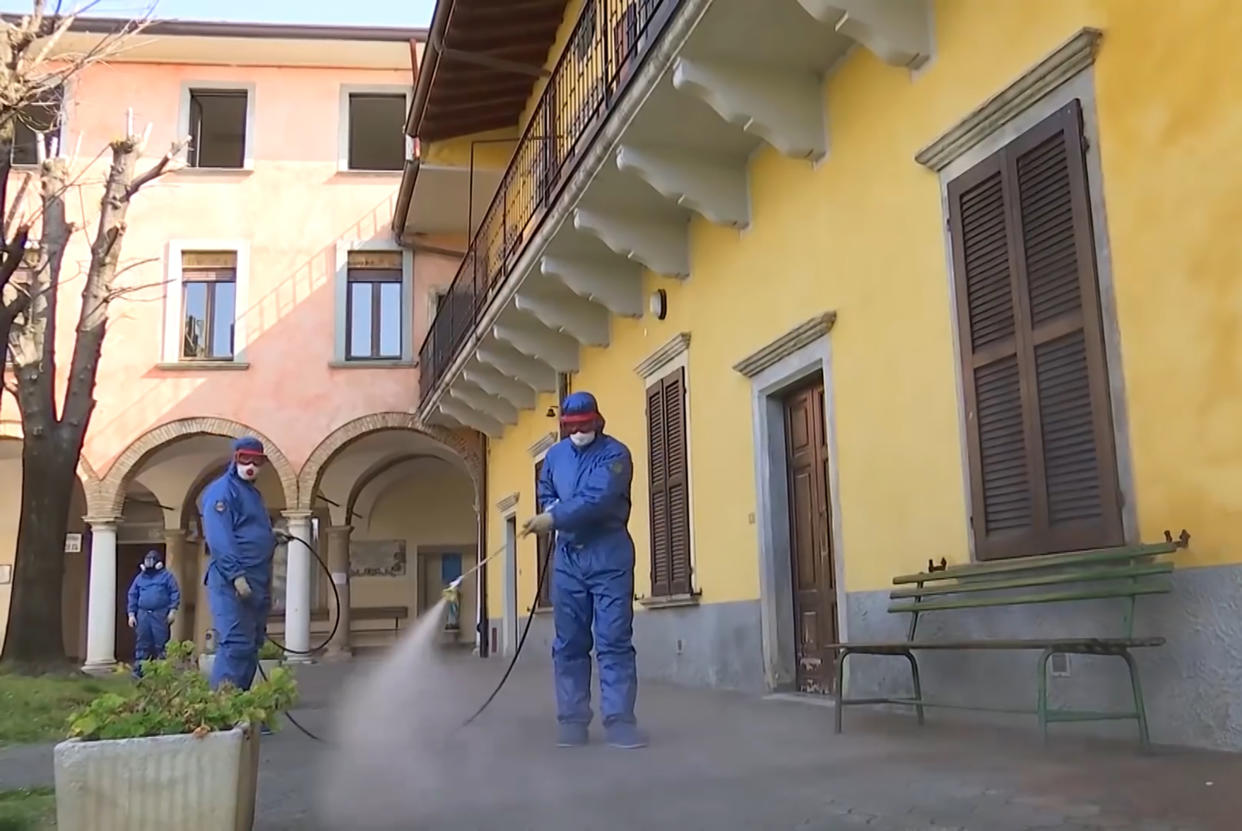 LOMBARDY, ITALY  APRIL 7, 2020: Russian military sanitary workers carry out a full disinfection and sanitising of indoor premises and the adjacent area of the San Giuseppe care home in Gorlago, Lombardy, northern Italy. Russia has sent military virologists, epidemiologists and CBRN specialists to Italy to help battle the pandemic of the novel coronavirus (COVID-19). Russian Defence Ministry/TASS (Photo by Russian Defence Ministry\TASS via Getty Images)