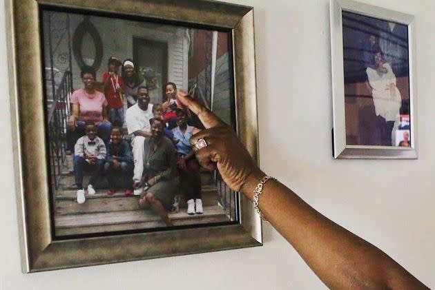 Priscilla points to a photo of her daughter, Schacana. (Photo: Phillip Jackson/HuffPost)