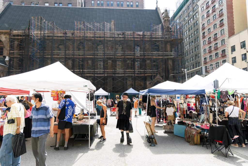 People shop outdoors at Chelsea Flea in NYC.