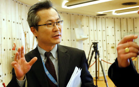Mun Jong Chol, counselor at the North Korea mission to the U.N. in Geneva, talks with journalists aside of a meeting of the Human Rights Council at the United Nations in Geneva, Switzerland March 24, 2017. REUTERS/Denis Balibouse