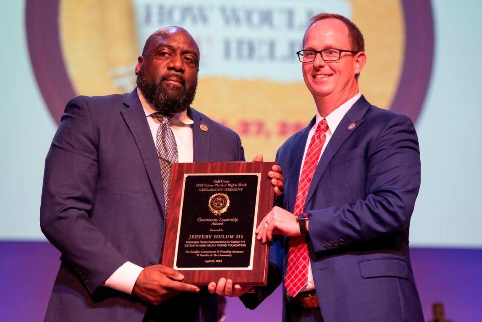 District Attorney Crosby Parker presents Mississippi House Rep. Jeffery Hulum III with a community leadership award during a candlelight ceremony as a part of National Crime Victims’ Rights Week at First Baptist Church of Gulfport on Tuesday, April 23, 2024.