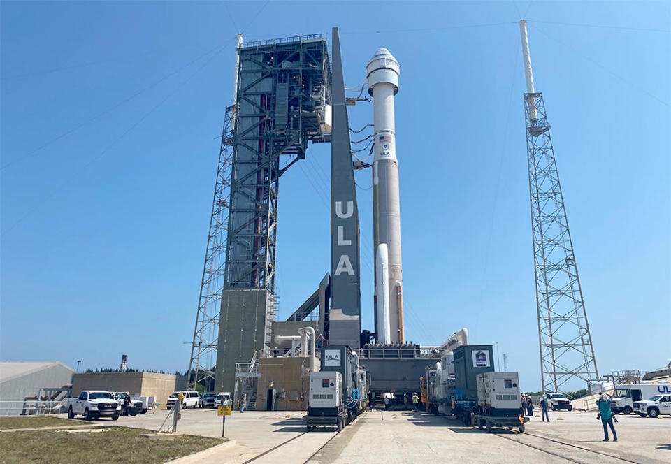 Boeing's Starliner capsule, perched atop a United Launch Alliance Atlas 5 rocket, was hauled to the launch pad Wednesday, setting the stage for blastoff Thursday on a high-stakes test flight to the International Space Station. / Credit: United Launch Alliance