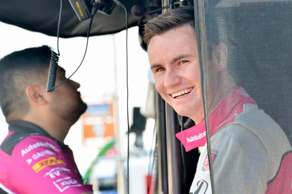 Andretti Autosport driver Kyle Kirkwood (27) stands in his pit box on Aug. 11 during practice for the Gallagher Grand Prix at Indianapolis Motor Speedway.