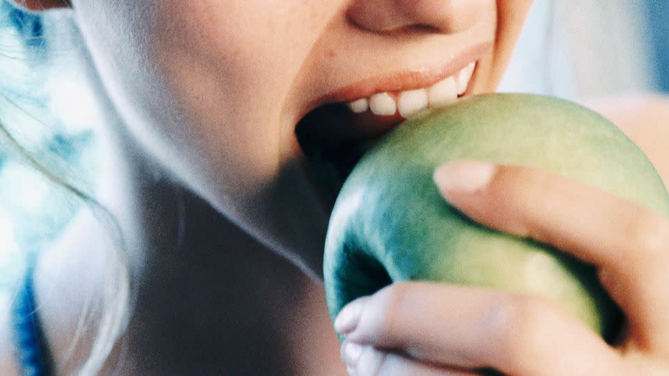 The natural sugar found in fruit is released slowly into the blood when it's consumed whole. - Britt Erlanson/The Image Bank RF/Getty Images