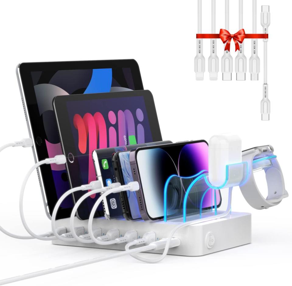 white charging station with devices plugged in