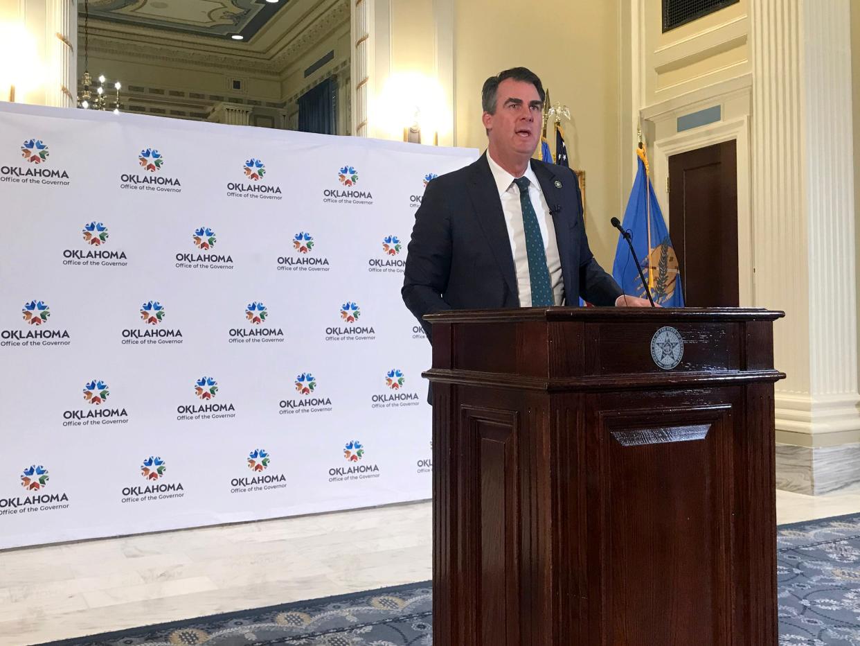 Gov. Kevin Stitt speaks during a news conference in March at the state Capitol.