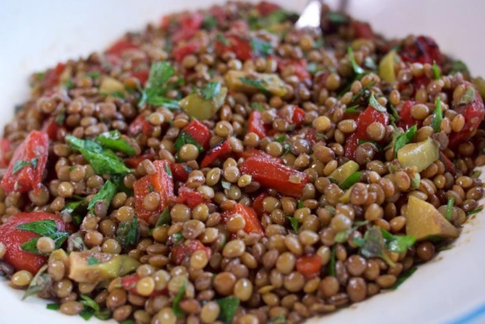 <p>Theresa Graco</p><p>This lentil salad is delicious eaten cold or at room temperature, plus it is easy to transport to any cookout or backyard barbecue. </p><p><strong>Get the recipe: <a href="https://parade.com/730547/theresagreco/mediterranean-lentil-salad/" rel="nofollow noopener" target="_blank" data-ylk="slk:Mediterranean Lentil Salad;elm:context_link;itc:0;sec:content-canvas" class="link ">Mediterranean Lentil Salad</a></strong></p>