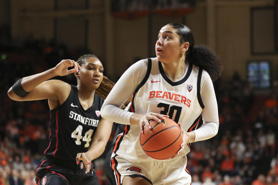 Oregon State forward Timea Gardiner (30) looks to the basket as Stanford forward Kiki Iriafen (44) defends during the first half of an NCAA college basketball game Thursday, Feb. 29, 2024, in Corvallis, Ore. (AP Photo/Amanda Loman)