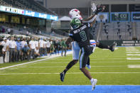 SMU wide receiver Rashee Rice (11) reaches for a touchdown pass against Tulane cornerback Jaylon Monroe (9) during an NCAA college football game in New Orleans, Friday, Oct. 16, 2020. (AP Photo/Matthew Hinton)