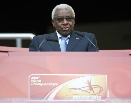 File photo: IAAF President Lamine Diack speaks during the opening ceremony of the 15th IAAF World Championships at the National Stadium in Beijing, China August 22, 2015. REUTERS/Damir Sagolj