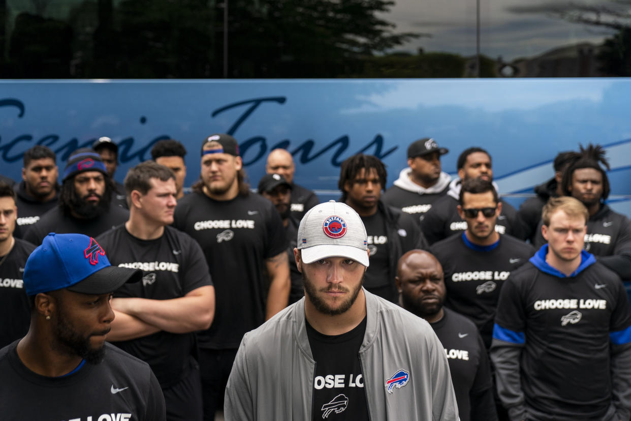 BUFFALO, NY - MAY 18: Buffalo Bills quarterback Josh Allen (17) and team members arrive for a visit to the Tops Friendly Market at Jefferson Avenue and Riley Street on Wednesday, May 18, 2022 in Buffalo, NY. The Supermarket was the site of a fatal shooting of 10 people at a grocery store in a historically Black neighborhood of Buffalo by a young white gunman is being investigated as a hate crime and an act of racially motivated violent extremism, according to federal officials. (Kent Nishimura / Los Angeles Times via Getty Images)