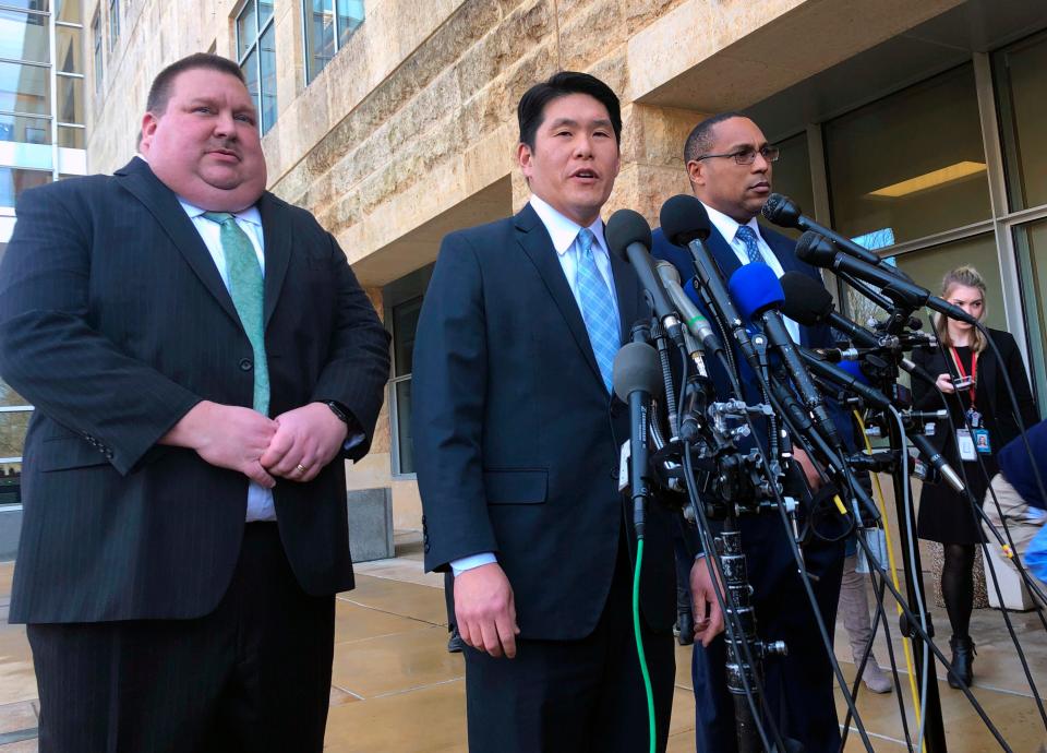 U.S. Attorney Robert Hur, center, of the District of Maryland, speaks during a news conference on Thursday, Feb. 21, 2019, outside a federal courthouse in Greenbelt, Md. Attorney General Merrick Garland appointed Hur on Thursday to further review the handling of classified documents found at a former office space used by President Biden and at his Wilmington, Del., home.