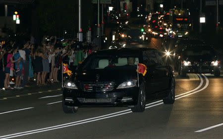 The vehicle carrying North Korean leader Kim Jong Un leaves the St Regis hotel in Singapore, June 11, 2018. REUTERS/Athit Perawongmetha