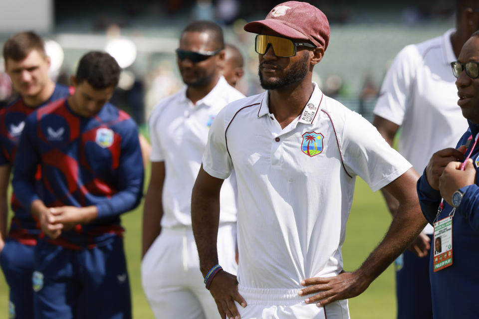 The West Indies' Kraigg Brathwaite, second right, watches the presentation after his team's loss to Australia on the fourth day of their cricket test match in Adelaide, Sunday, Nov. 11, 2022. (AP Photo/James Elsby)