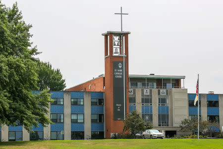 The bell tower on the Roman Catholic St. Mark's Seminary is seen in Erie, Pennsylvania, U.S. August 15, 2018. REUTERS/Paul Gibbens