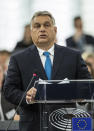 Hungary's Prime Minister Viktor Orban delivers his speech at the European Parliament in Strasbourg, eastern France, Tuesday Sept.11, 2018. The European Parliament debates whether Hungary should face political sanctions for policies that opponents say are against the EU's democratic values and the rule of law. (AP Photo/Jean-Francois Badias)