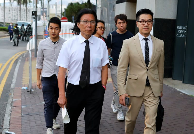 Pro-democratic winning candidates at district council local elections get inside the campus of the Polytechnic University (PolyU) in Hong Kong