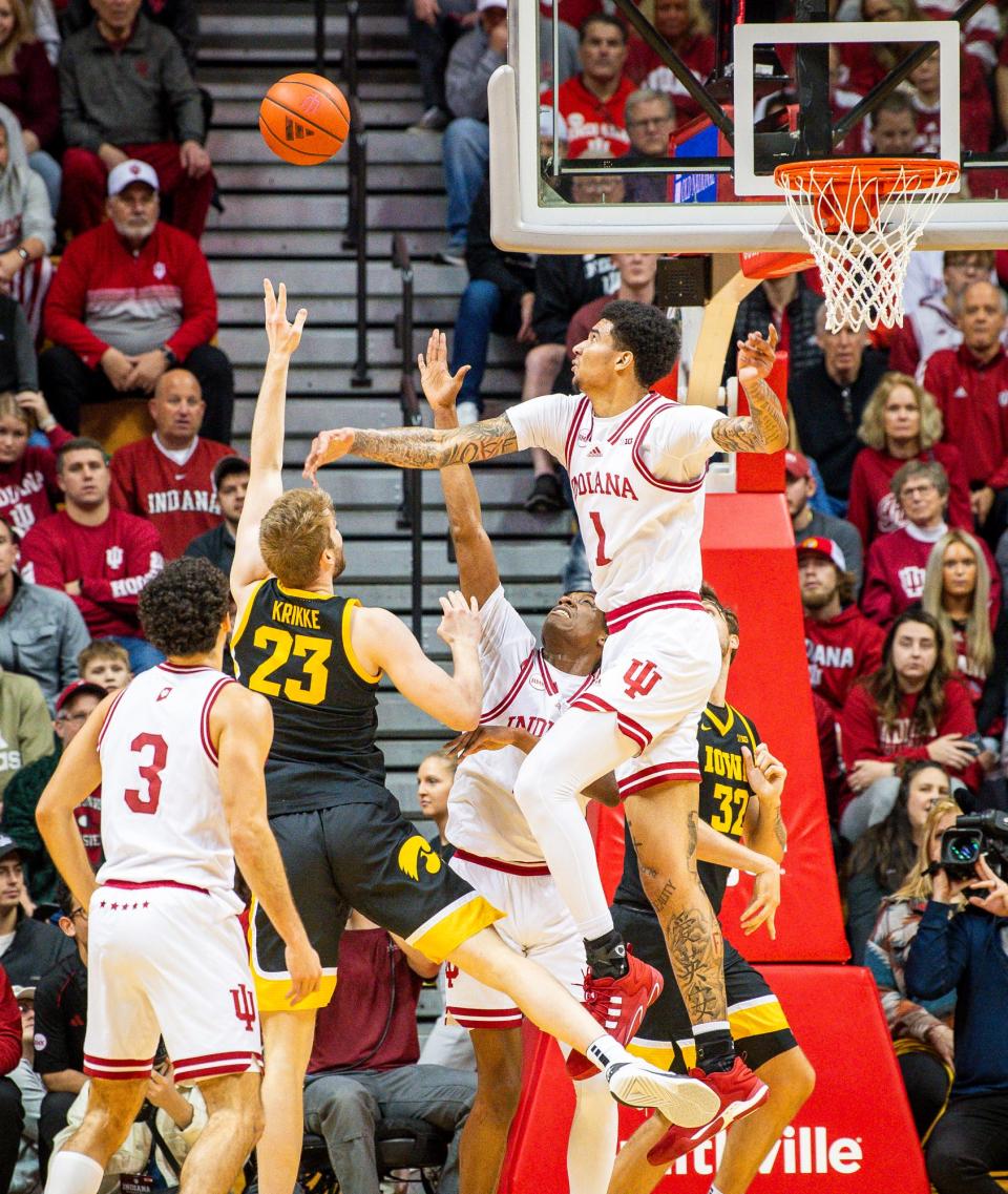 Indiana's Kel'el Ware (1) blocks Iowa's Ben Krikke (23) during the first half of the Indiana versus Iowa men's basketball game at Simon Skjodt Assembly Hall on Tuesday, Jan. 30, 2024.