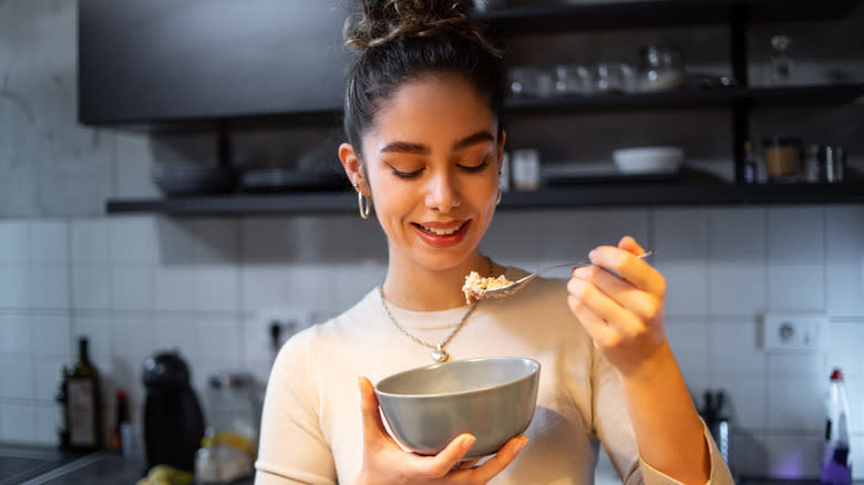 Woman eating oatmeal