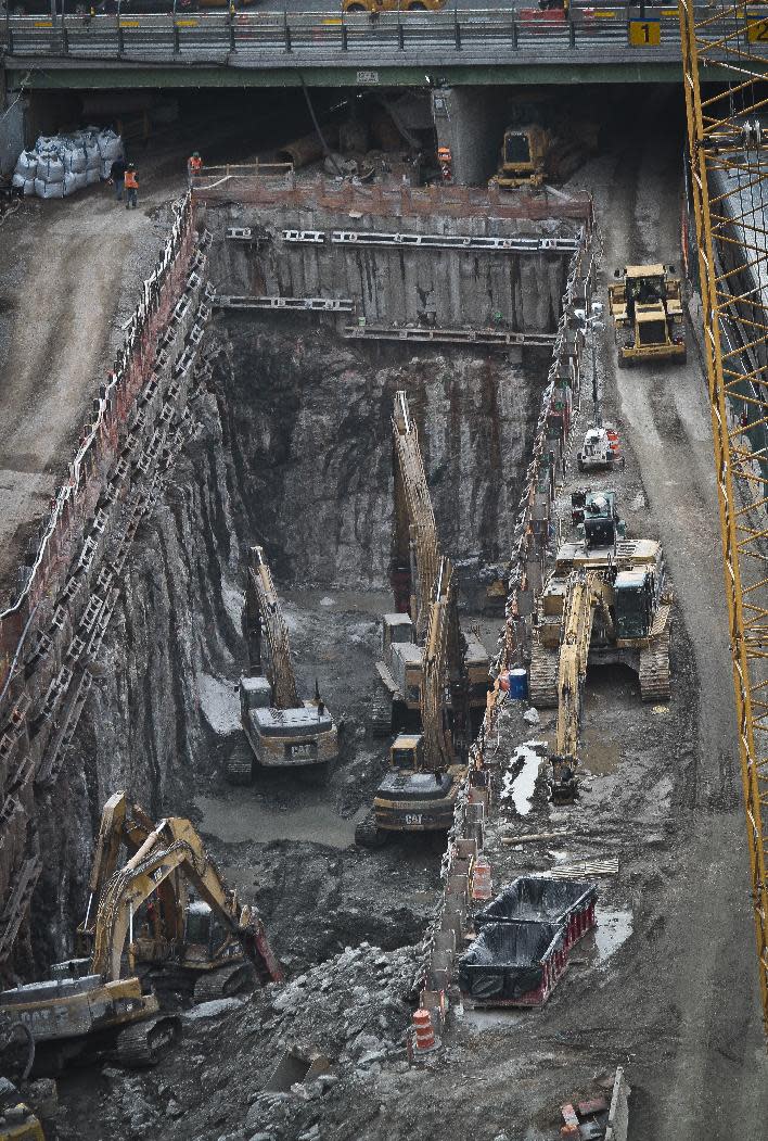 This photo taken on Thursday April 17, 2014, shows ongoing construction of a rail tunnel at the Hudson Yards redevelopment site on Manhattan's west side in New York. Amtrak is constructing an 800-foot-long concrete box inside the project to preserve space for a tunnel from Newark to New York City that would allow it to double rail capacity across the Hudson River. (AP Photo/Bebeto Matthews)