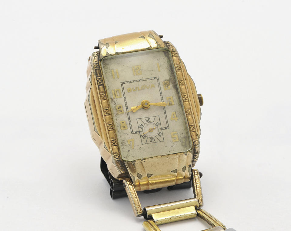 In this May 9, 2019, photo provided by RR Auction, a watch belonging to Clyde Barrow is shown. A book of poetry handwritten by Bonnie Parker and a watch belonging to Clyde Barrow are among items from the outlaw Texas couple being offered at auction. (AP Photo/RR Auction, Nikki Brickett)