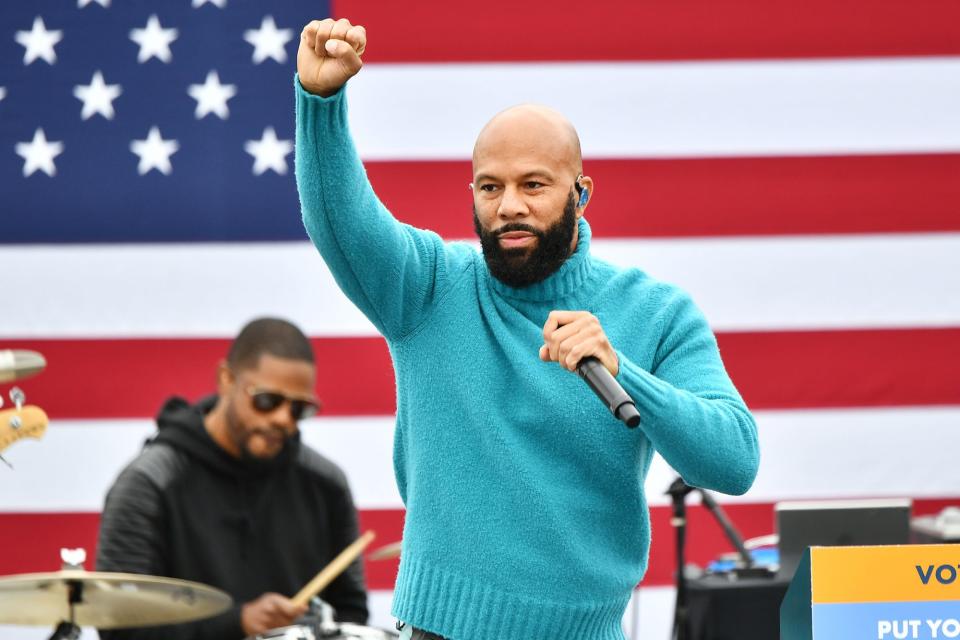 <p>Common takes the stage to perform during the Souls to the Polls drive-in rally for Rev. Raphael Warnock on Sunday at Riverside EpiCenter in Austell, Georgia.</p>
