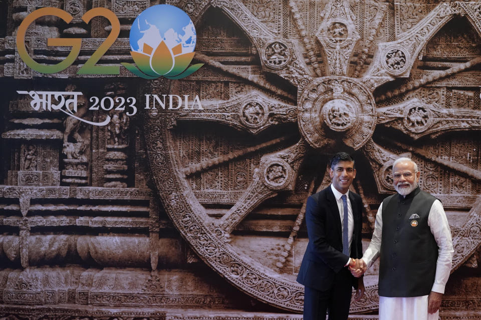 Indian Prime Minister Narendra Modi welcomes British Prime Minister Rishi Sunak upon his arrival at Bharat Mandapam convention center for the G20 Summit, in New Delhi, India, Saturday, Sept. 9, 2023. (AP Photo/Evan Vucci,Pool)