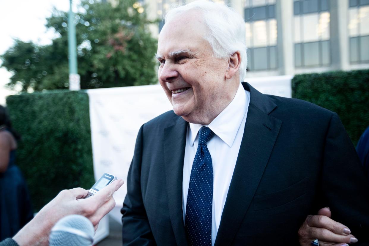 Fred Smith, founder of FedEx, speaks with media on the red carpet of the Freedom Awards on Oct. 20, 2022, in Memphis.