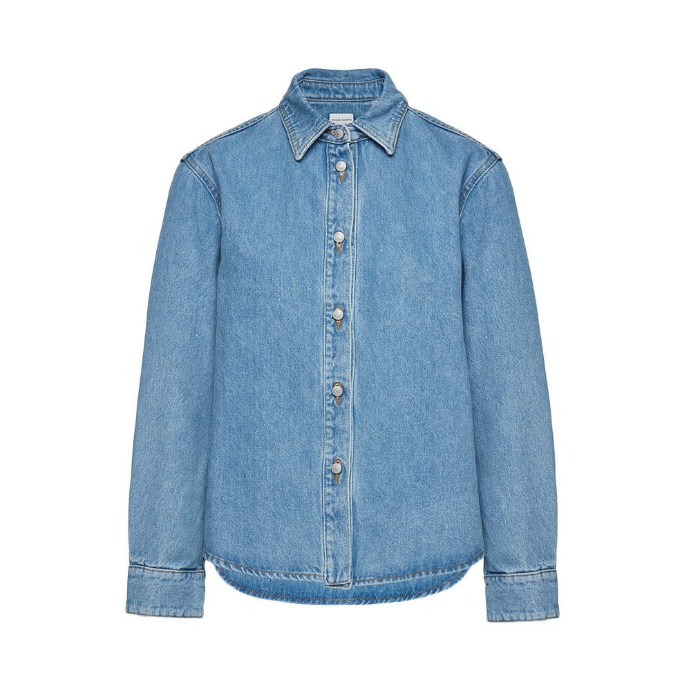 <p><a href="https://www.magdabutrym.com/us-en/product/ss24-denim-02-shirt-light-blue" rel="nofollow noopener" target="_blank" data-ylk="slk:Shop Now;elm:context_link;itc:0;sec:content-canvas" class="link rapid-noclick-resp">Shop Now</a></p><p>Classic Oversized Denim Shirt </p><p>magdabutrym.com</p><p>$970.00</p>