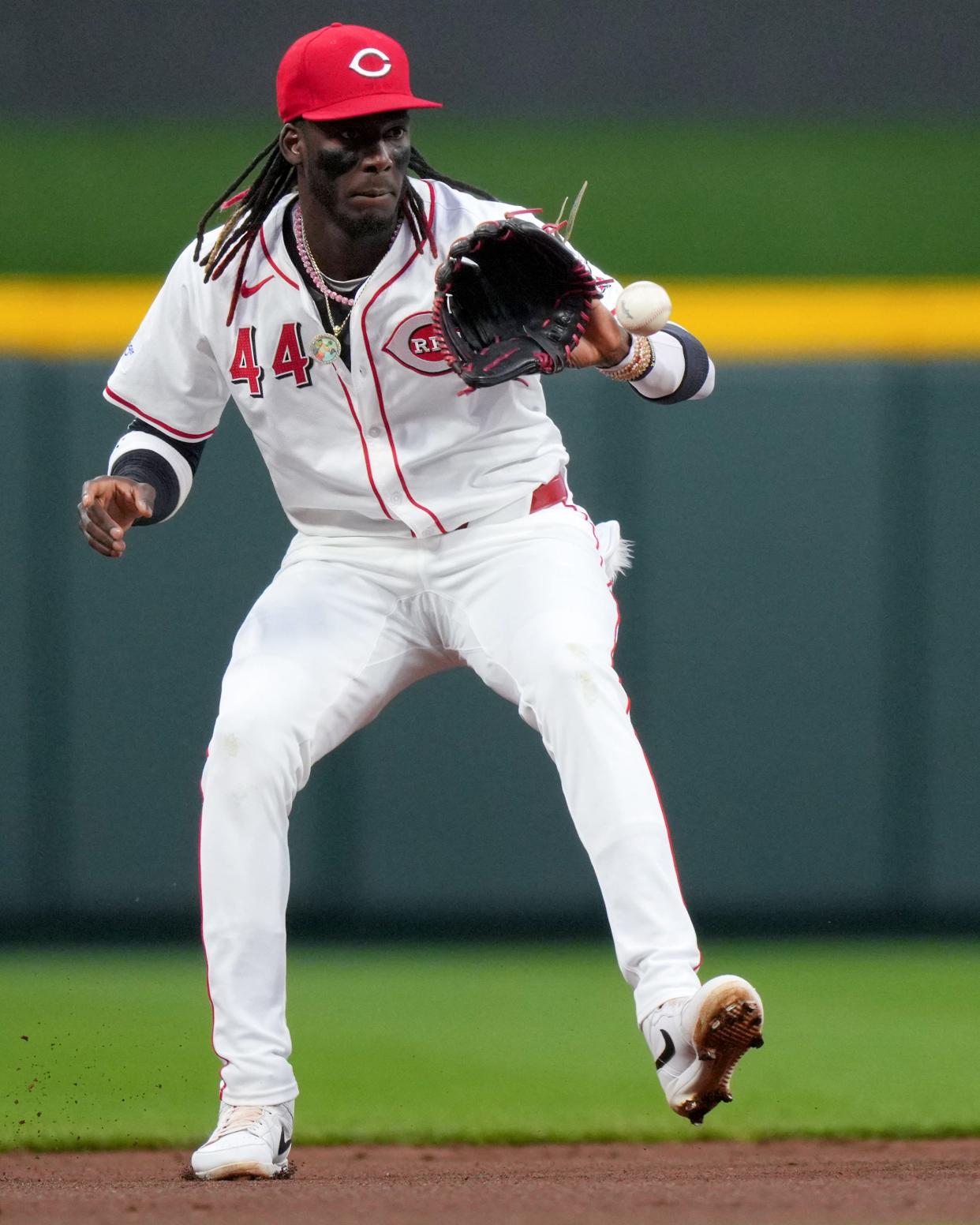 Cincinnati Reds shortstop Elly De La Cruz (44) fields a groundball in the first inning of a baseball game against the Milwaukee Brewers Tuesday, April 9, 2024, at Great American Ball Park in Cincinnati.