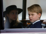 <p>Britain's Prince George and Princess Charlotte sit in a car on the day of the state funeral and burial of Britain's Queen Elizabeth, at Westminster Abbey, in London, Britain, September 19, 2022. (Photo by SARAH MEYSSONNIER / POOL / AFP) (Photo by SARAH MEYSSONNIER/POOL/AFP via Getty Images)</p> 