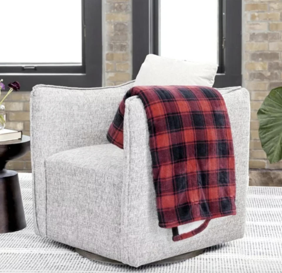 blue plaid blanket on the chair