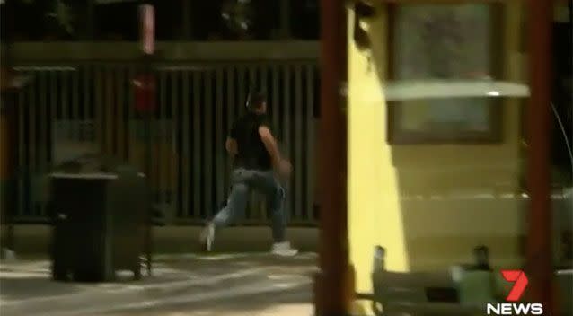 The Sydney father running from court on Tuesday. Source: 7 News