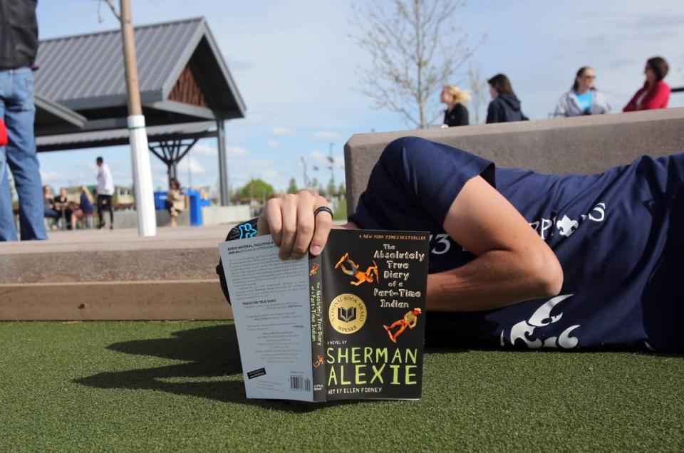 An Idaho high school student reads “The Absolutely True Diary of a Part-Time Indian” by Sherman Alexie in this 2016 photo. An updated Wake County school policy would require teachers to discuss with other school staff before they read aloud excerpts from books in class. Joe Jaszewski/jjaszewski@idahostatesman.com