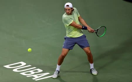 Tennis - ATP - Dubai Open - Semifinal - Dubai, United Arab Emirates - March 2, 2018. Lucas Pouille of France in action against Filip Krajinovic of Serbia. REUTERS/Satish Kumar