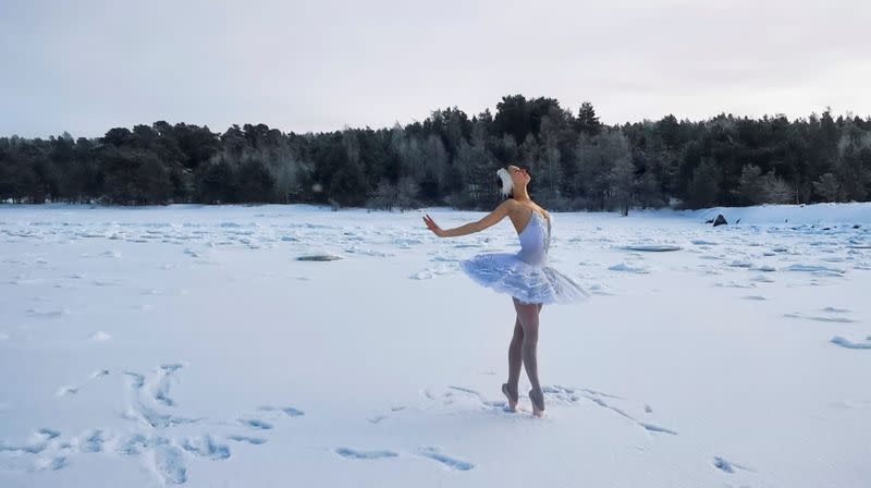 Ballet dancer Ilmira Bagautdinova performs on the ice of frozen Batareynaya Bay in Leningrad region