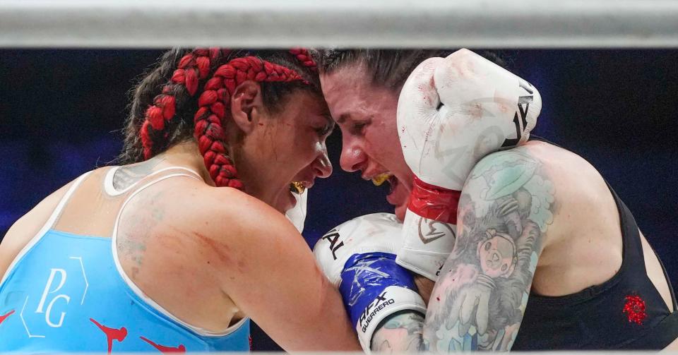 Pearl Gonzalez, left, and Gina Mazany compete in Jorge Masvidal’s Gamebred Boxing 126 weight class boxing match Saturday, April 1, 2023,  at Fiserv Forum in Milwaukee. Mazany defeated Gonzalez.