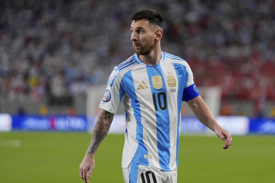 Argentina's Lionel Messi walks to take a corner kick during a Copa America Group A soccer match against Chile in East Rutherford, N.J., Tuesday, June 25, 2024. (AP Photo/Julia Nikhinson)