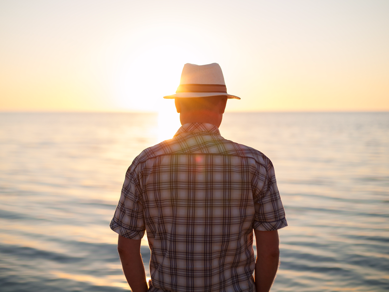 man thinking ocean view