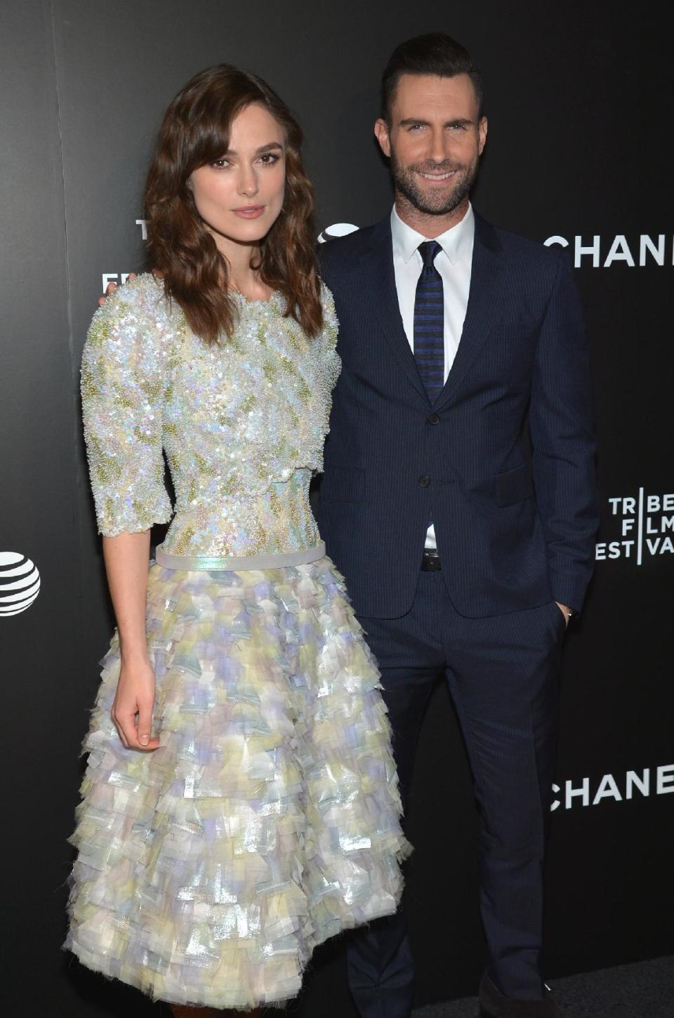 Keira Knightley, left, and Adam Levine arrive at the premiere of "Begin Again" at the Tribeca Film Festival on Saturday, April 26, 2014, in New York. (Photo by Evan Agostini/Invision/AP)