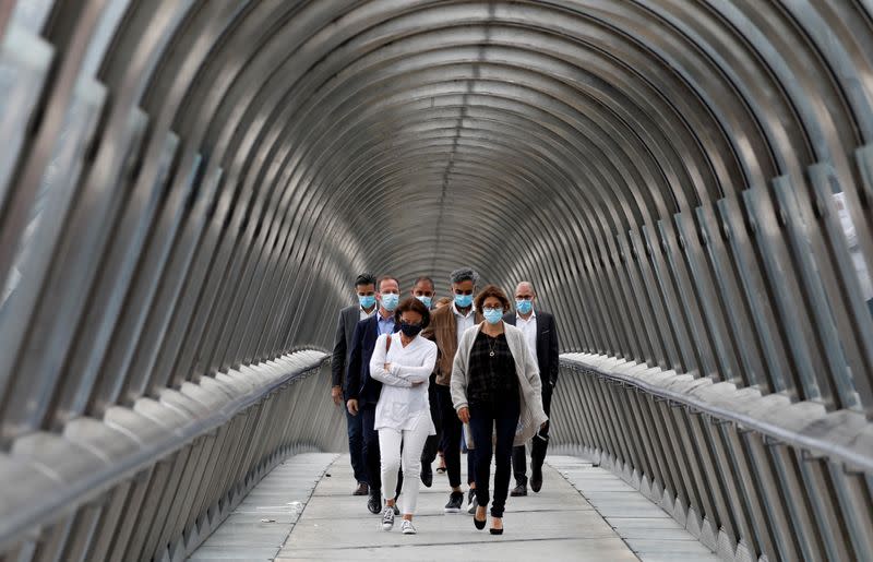 Masked people at financial and business district of La Defense